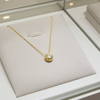 ciondolo punto luce a cipollina in oro giallo 18k e diamante naturale  0,30 ct